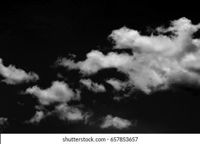 Isolated Clouds Over Black.