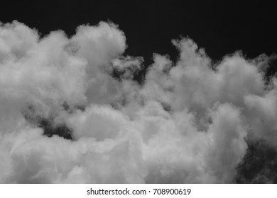 Isolated Clouds Over Black.