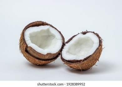 Isolated coconut on a white background. Two halves of a coconut. Healthy food
