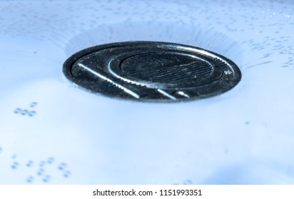 Isolated Coin In A Glass Of Water Floats On The Water Surface - Surface Tension Physical Laws