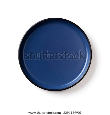 Isolated dark blue plate on a white background. Clipping path. 