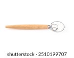 Isolated dough whisk. Side view of handheld wooden whisk Baking tool to blend and mix bread dough or batter. Also known as Danish dough whisk or brodpisker. Selective focus. White background.