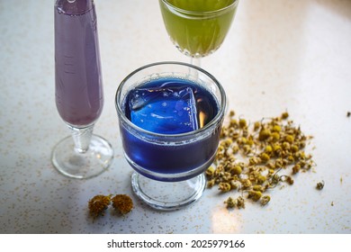 Isolated drinks with ice on a table