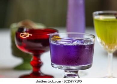 Isolated drinks with ice on a table