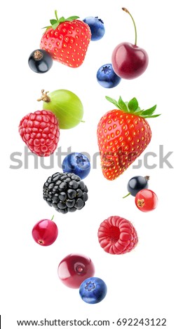Isolated falling berries. Mixed fruits in the air (blueberry, blackberry, raspberry, strawberry, gooseberry, cherry, black and red currants) isolated on white background with clipping path