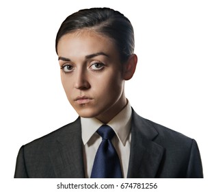 Isolated fashion portrait of a young woman dressed in men's clothes. The concept of a strong woman in the role of a man.