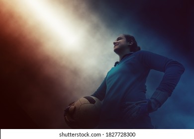 Isolated Female Soccer Goalkeeper With Soccer Ball