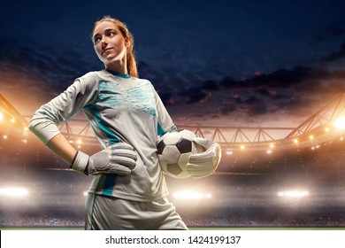 Isolated Female Soccer Goalkeeper on white background. Girl with soccer ball - Powered by Shutterstock