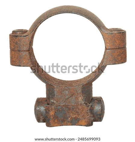Isolated front view of the base and ring used to mount a riflescope to a gun but is no longer usable to advanced rusting.