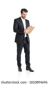 Isolated full length portrait of businessman with clipboard. Concept of paperwork and leadership