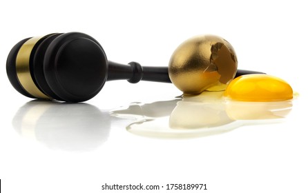 Isolated Gavel Mallet With Cracked Gold Egg.