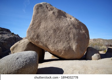 Isolated gigantic boulder among other sites to see at Joshua Tree National Park, California - Shutterstock ID 1894032778