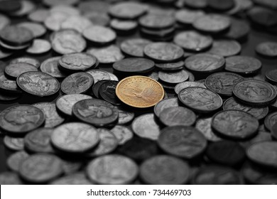 Isolated Golden Coin With An Old Coin Stacking Around