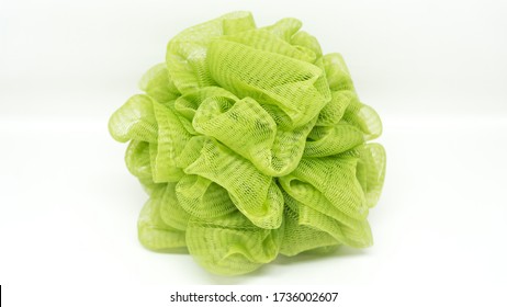 isolated of green ball soft bath sponge or shower sponge on white background.