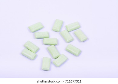 Isolated green color rectangle shape tablets on a white background.