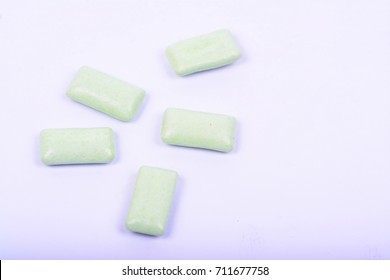 Isolated green color rectangle shape tablets on a white background.