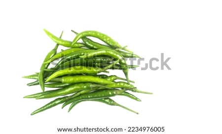 Isolated green unripe chili on white background soft and selective focus                               