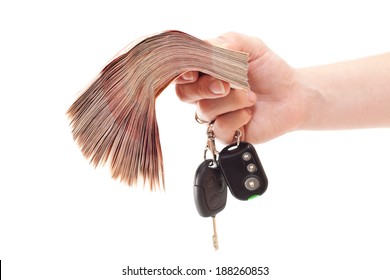 Isolated Hand With Cash Money And Car Key. White Background