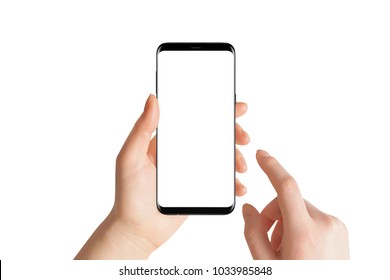 Isolated hands and smartphone on white background. Female hand holding modern black phone in vertical position. - Shutterstock ID 1033985848