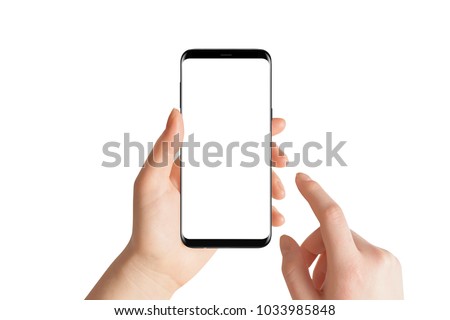 Isolated hands and smartphone on white background. Female hand holding modern black phone in vertical position.