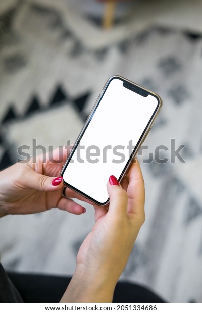 isolated hands using mobile phone with clipping\
path : woman hands using mobile, smart phone on colorful bokeh of\
night street background : Technology mobile phone concept. High\
quality photo