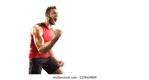 Isolated Happy Beautiful Male Athlete. Man Sprinter In Sport Clothes Emotionally Rejoices Victory On White Background