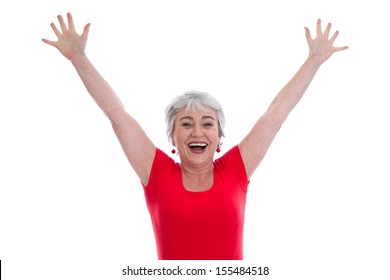 Isolated happy senior woman celebrating victory
