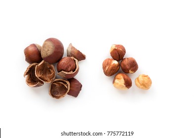 Isolated Hazelnut Kernels On White Background. Top View. Cracked Shell.