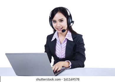 Isolated helpline operator with laptop computer