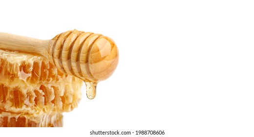 isolated of honey dripping with honeycomb on white background.