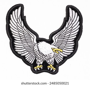 Isolated illustrated eagle patch with black trim.