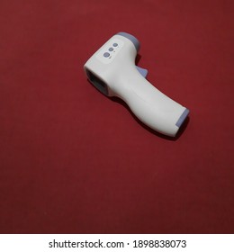 Isolated Image Of A Body Temperature Gauge, Which Is Now Often Called A Thermogun