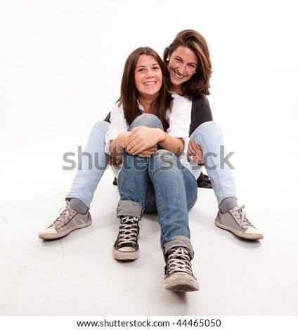 Isolated image of a mother and daughter in laughing together