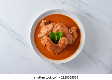 Isolated Kare Ayam (Gulai Ayam) or Kari Ayam or Chicken Curry is Chicken Meat in turmeric and coconut milk soup. Usually served during Ramadan Celebration