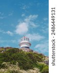 Isolated lighthouse with blue sky at cape point in Cape Town