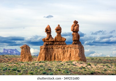 Isolated Line Of Hoodoos, Near The Entrance To The Valley. Goblin Valley State Park, Utah, US