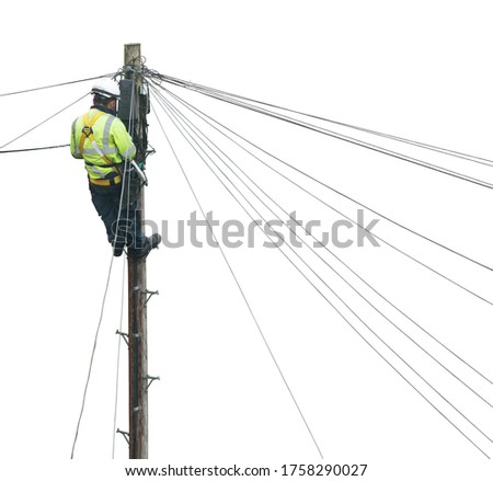Isolated Lineman (Or Lineworker or Engineer) Fixing A Telephone Line