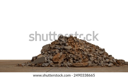 Isolated, low angle view, broken pieces of cement concrete wall which were demolished, excavated, destroyed and left in a pile on the concrete floor waiting to be reused in a landfill.
