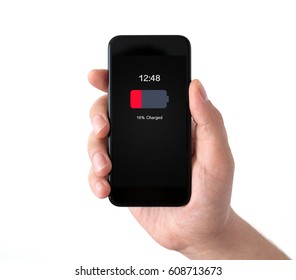 Isolated Male Hand Holding Black Phone With Low Charged Battery On Screen