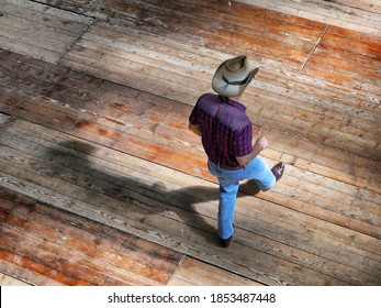 Isolated man view from above of line dance traditional western folk music dancers blur dynamism effect selective focus on boot