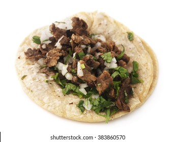 Isolated Mexican taco. Isolated mexican steak taco on a white background.