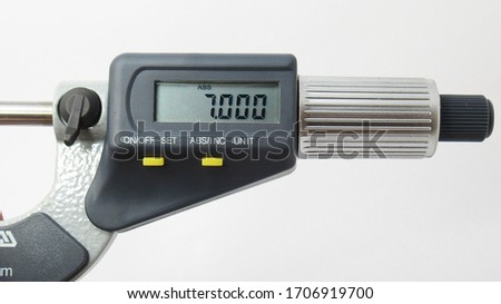 A isolated micrometer with a digital display,Located on white background,Easy to use in any work