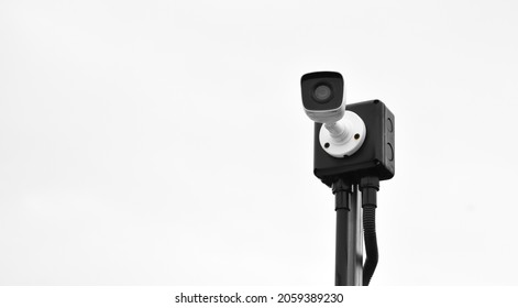 Isolated mini ip cctv camera on pole with clipping paths.