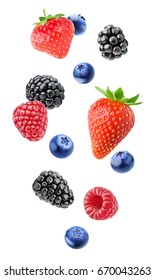 Isolated Mixed Berries In The Air. Falling Blackberry, Raspberry, Blueberry And Strawberry Fruits Isolated On White Background With Clipping Path