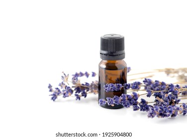 Isolated Mockup Essential Oil Lavender Branches On A White Background With Copy Space. Brown Glass Cosmetic Bottle, Serum.