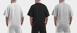 Isolated Mockup Of Oversized Men's T-shirt For Design, Print, Pattern. Template Of Fashionable Clothes. Back View