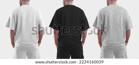Isolated mockup of oversized men's t-shirt for design, print, pattern. Template of fashionable clothes. Back view
