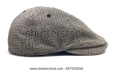 Isolated Newsboy Cap. Retro wool driver cap on a white background.