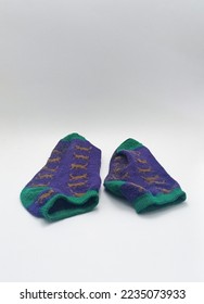 Isolated objects: short socks with hues, on white background