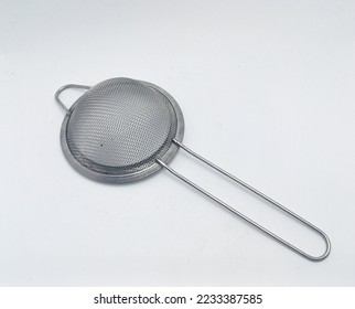 Isolated objects: Strainer Tea Orange Drink made of stainless, on white background.